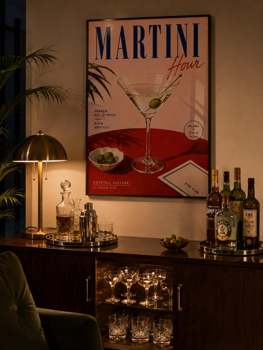 Martini Hour Typography Poster displayed above a stylish home bar with warm lighting and dark wood furniture