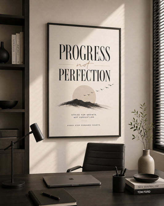 Progress Not Perfection Typography Poster displayed in a modern home office.